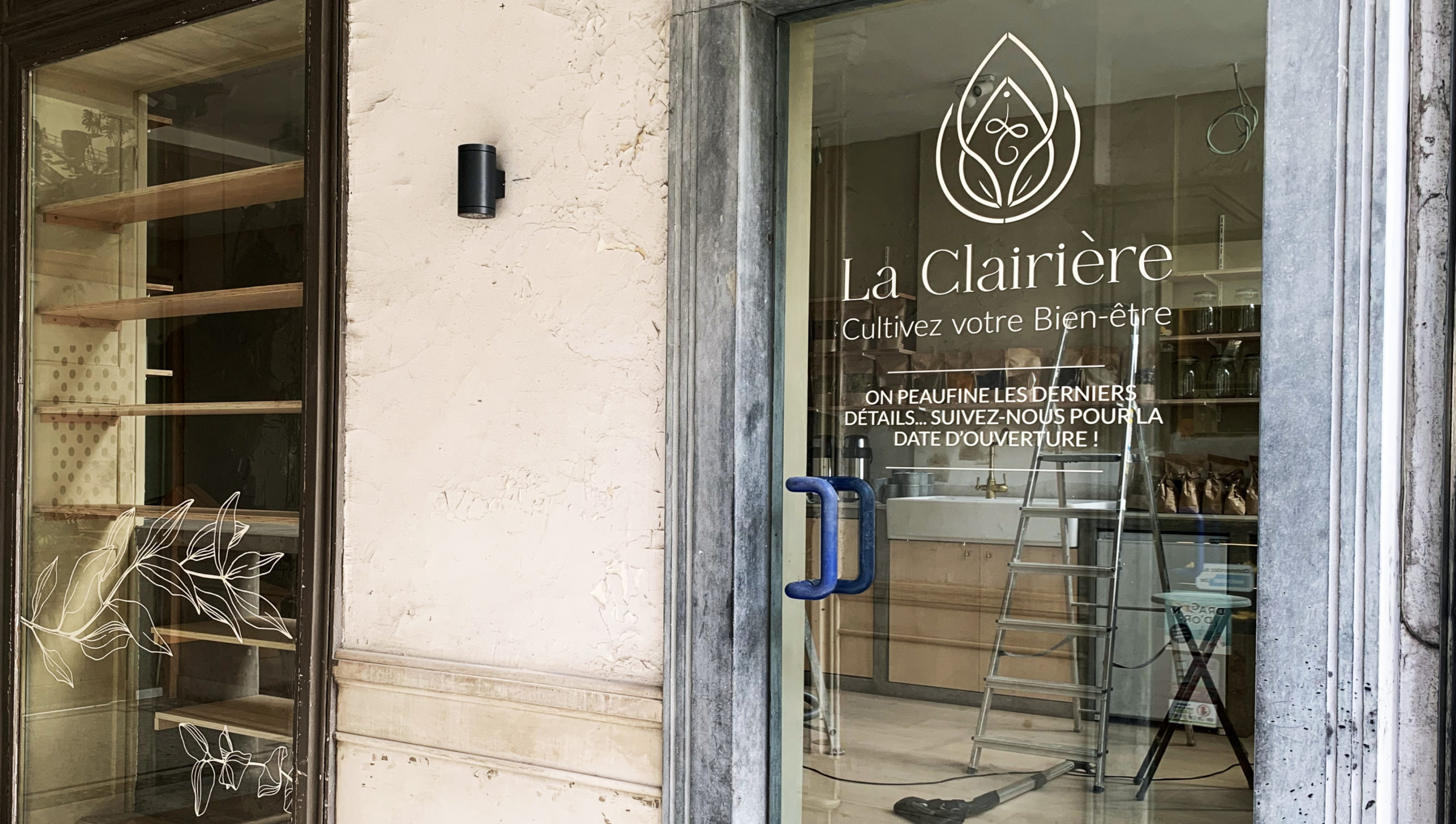 Lettrage vitrine pour commerce (Mons)